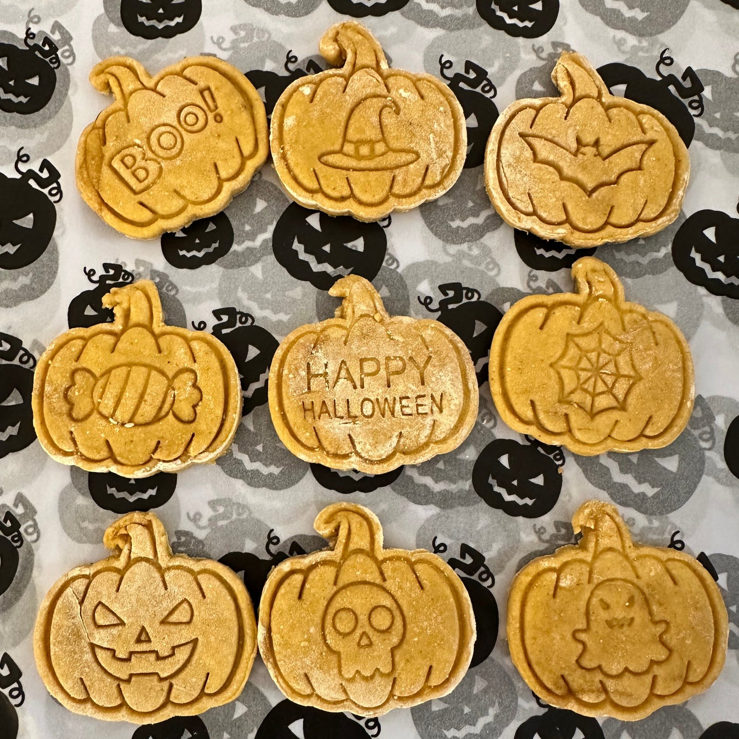 A selection of Pumpkin Pickings dog biscuits by Percy's Pawfect Pantry