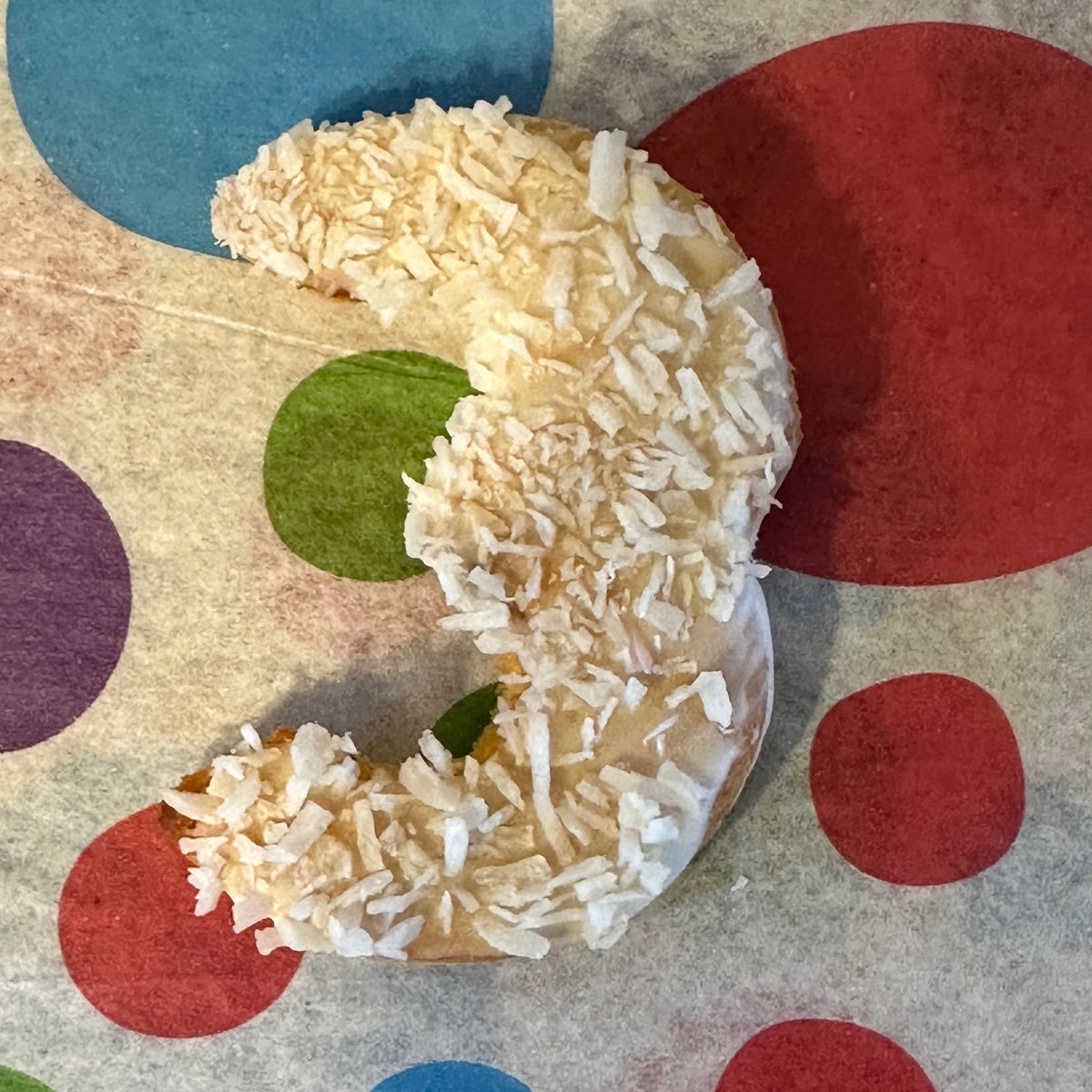 Personalised age number dog biscuit covered with coconut