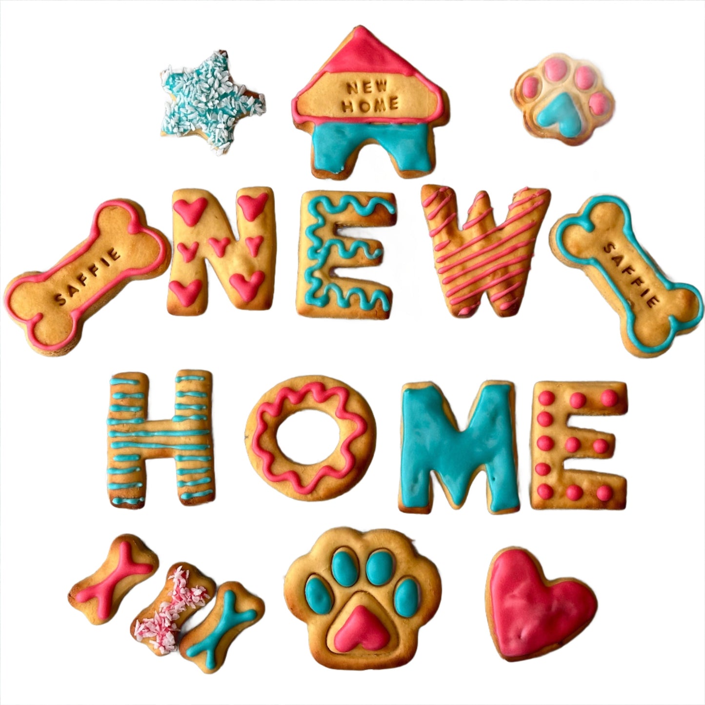 A collection of colourful dog treats with various decorations such as bones, paws, and hearts, spelling out 'HOME'.