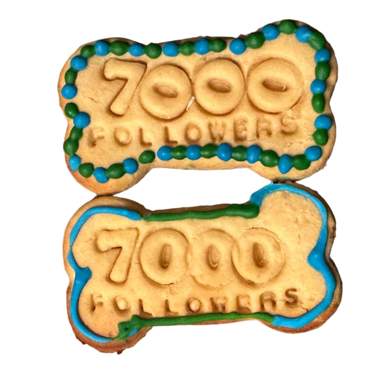 Two dog bone biscuits with "7000 Followers"