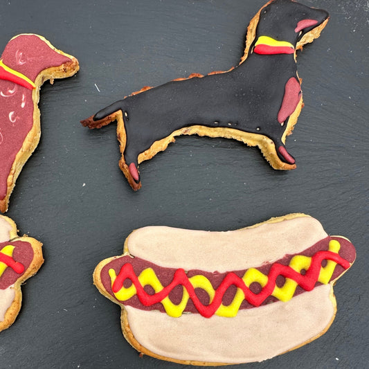 Close up of sausage dog biscuit with a hot dog shaped dog biscuits