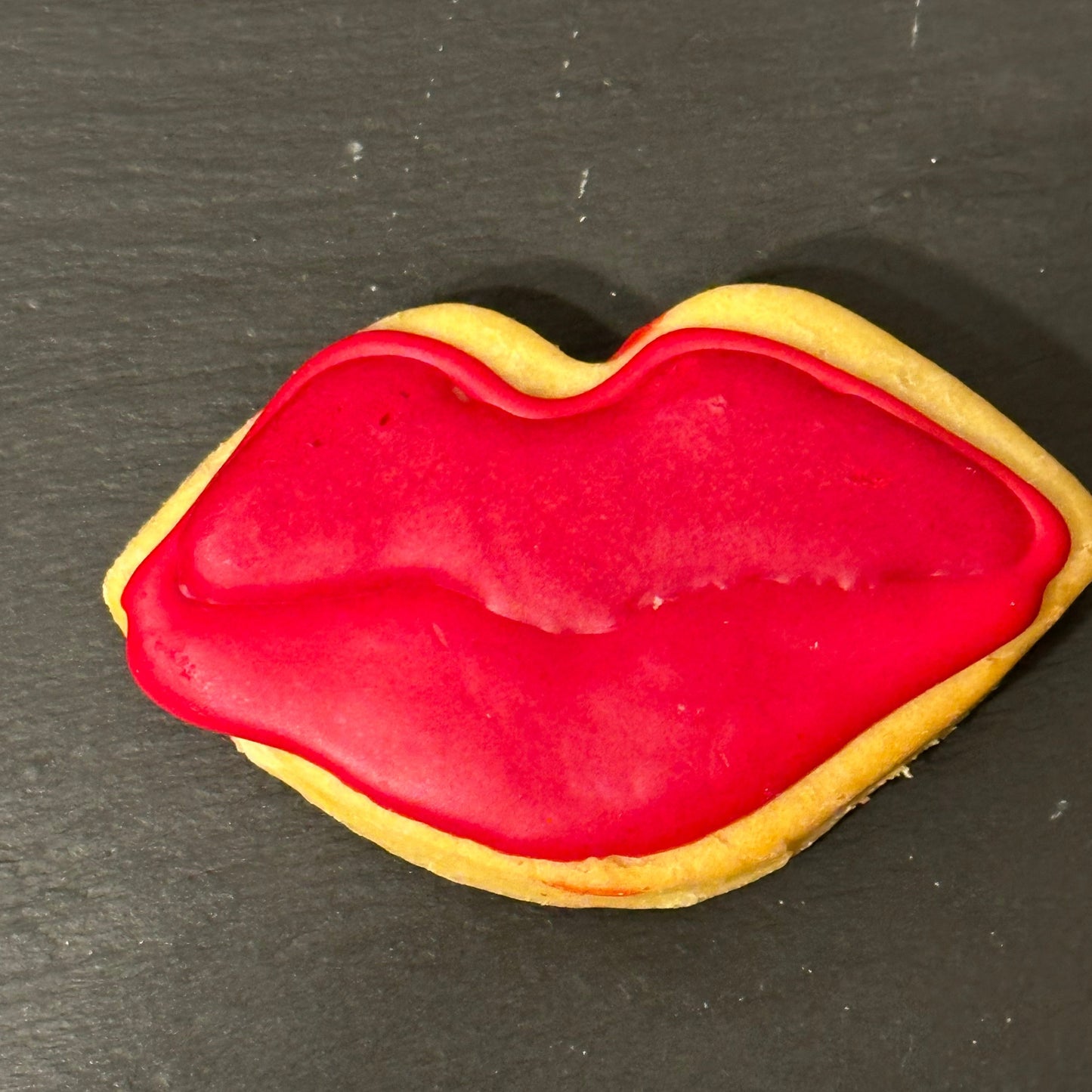 A red lip dog biscuit
