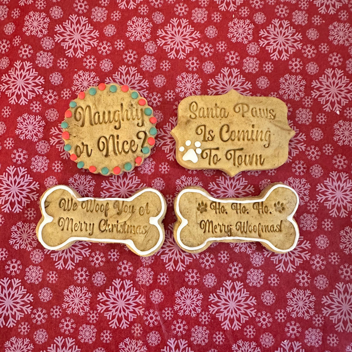 Merry Christmas Selection Box with four iced Christmas dog biscuits