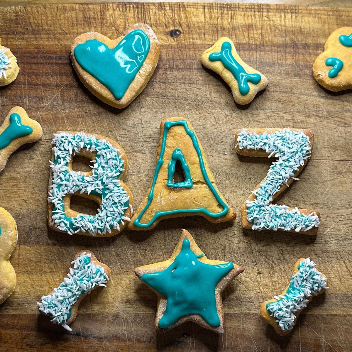 A selection of dog biscuits spelling "BAZ"