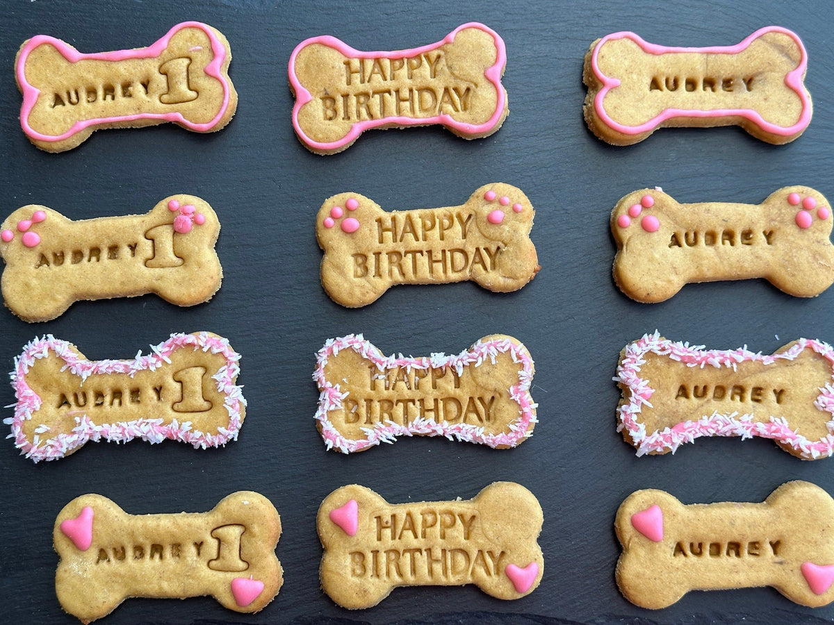 Personalised bone dog biscuits stamped with dogβs name