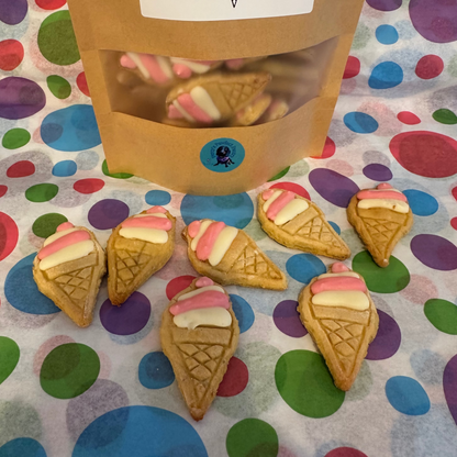 Bag of Percy's Pawfect Pantry Mini Scoopies Banana & Honey Cookies on a colorful polka dot tablecloth.