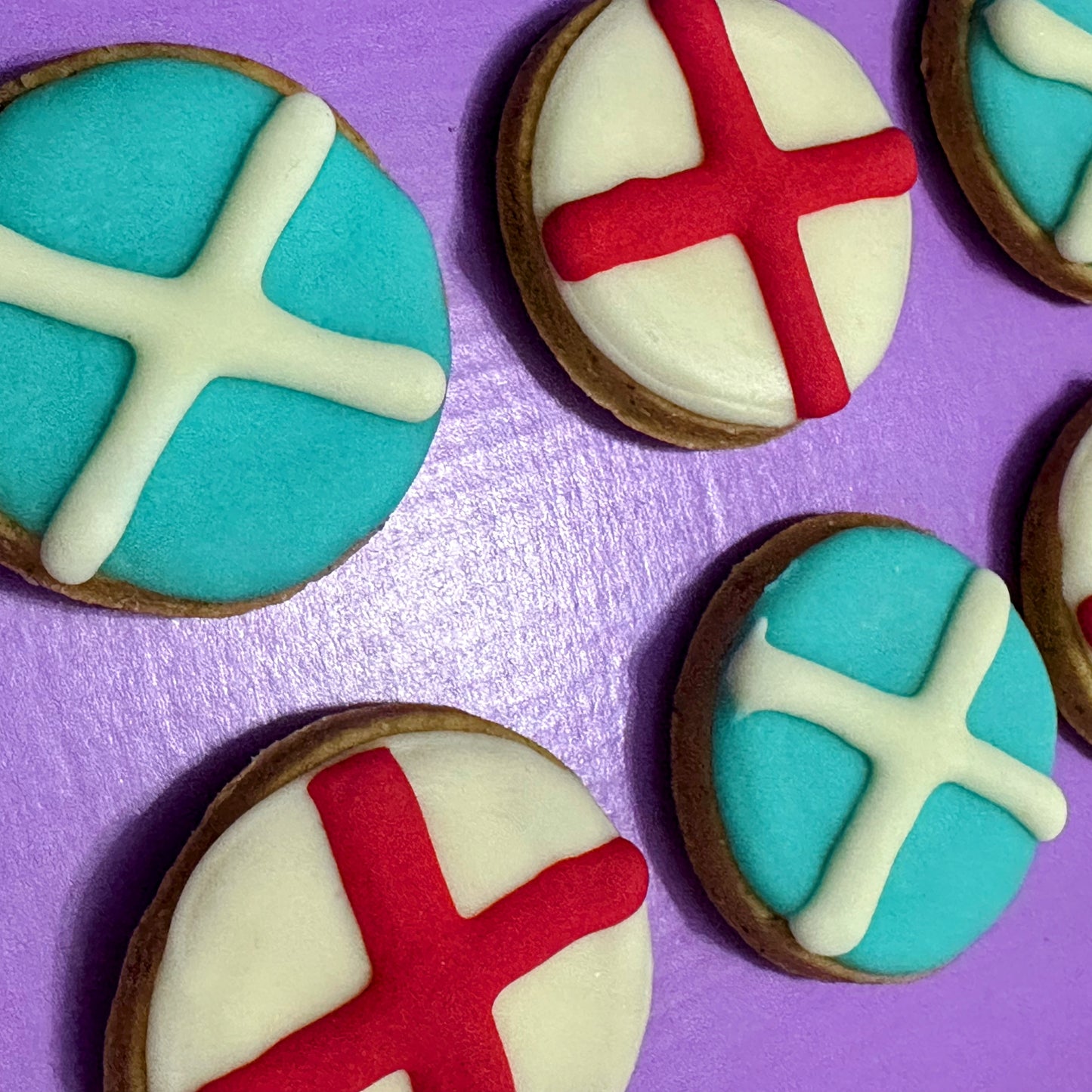 Football-themed dog biscuits decorated as Scotland and England flags, handmade grain-free dog treats for match days, football celebrations and World Cup supporters