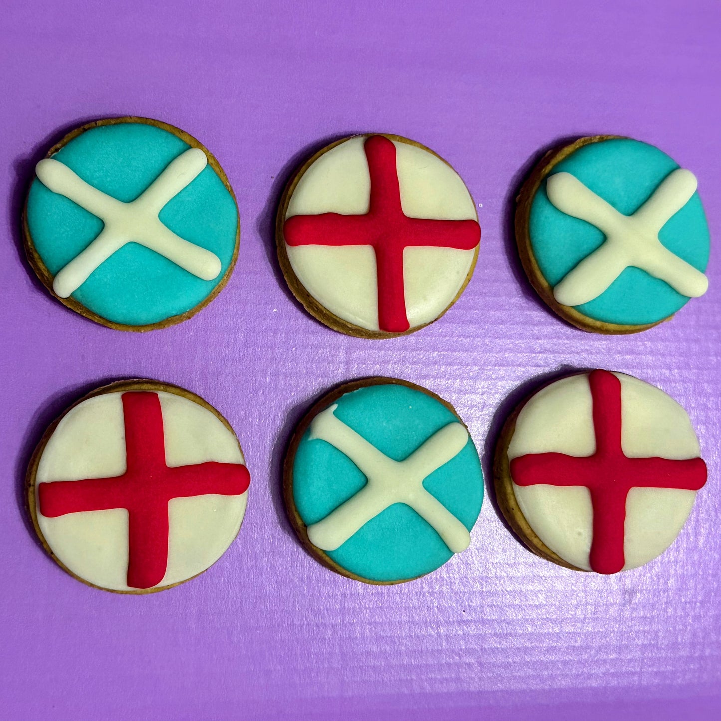 Football-themed dog biscuits decorated as Scotland and England flags, handmade grain-free dog treats for match days, football celebrations and World Cup supporters.