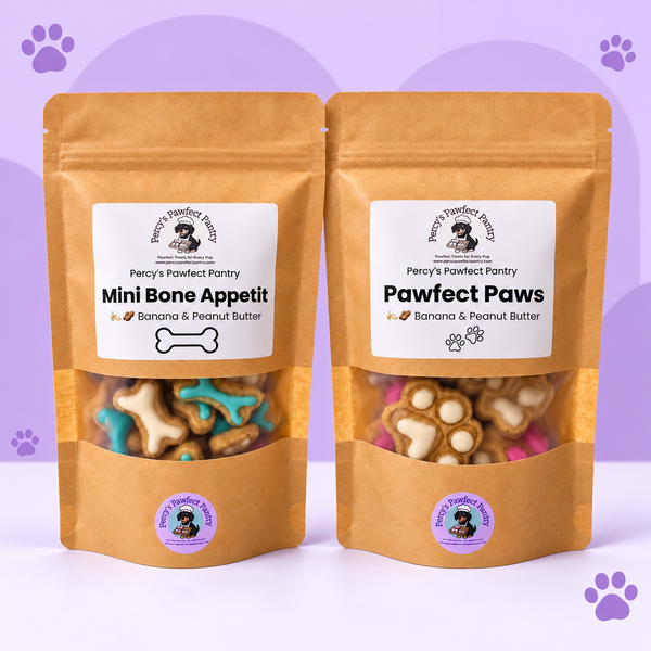 Mini Bone Appetit and Pawfect Paws banana and peanut butter dog biscuit bags on a lavender background with purple paw prints.