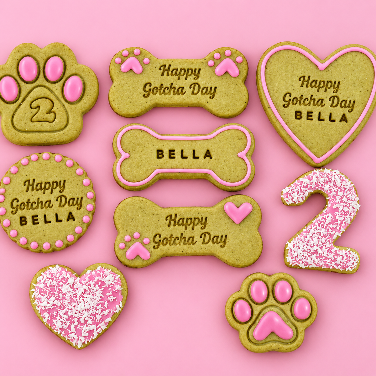 Personalised Gotcha Day dog biscuits with name, hearts, bones and paw print design