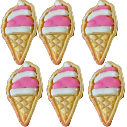 Six ice cream cone cookies with pink and white filling on a white background