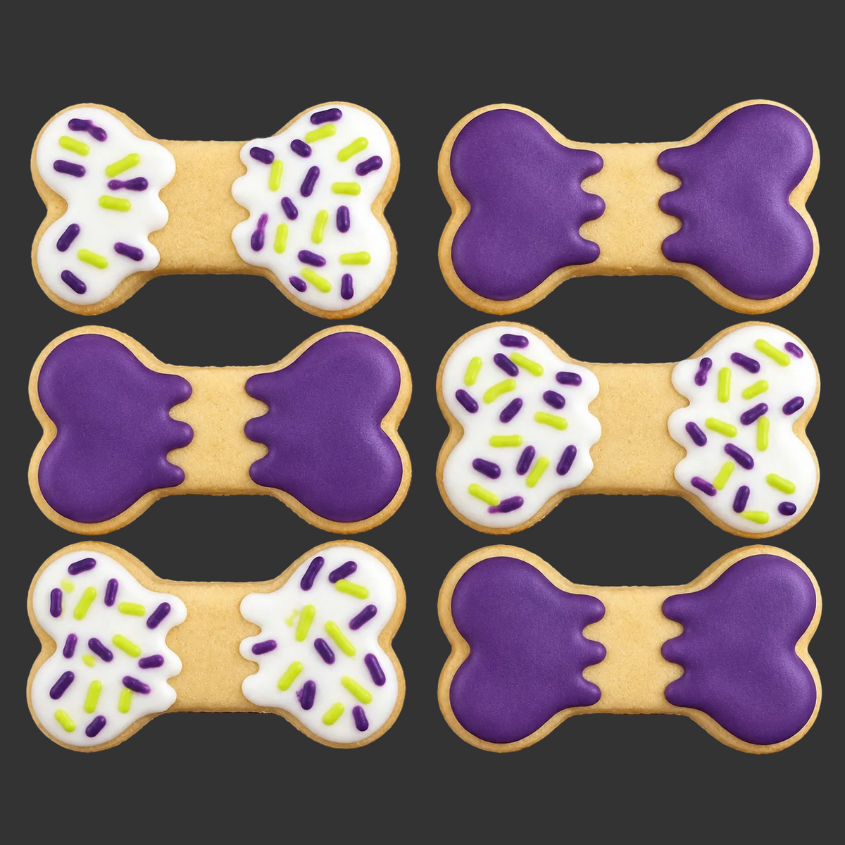 Six bone-shaped cookies decorated with purple and white icing and sprinkles,